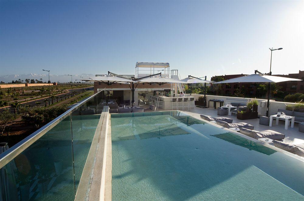 塞萨尔Spa度假酒店 马拉喀什 外观 照片 The rooftop pool at the hotel